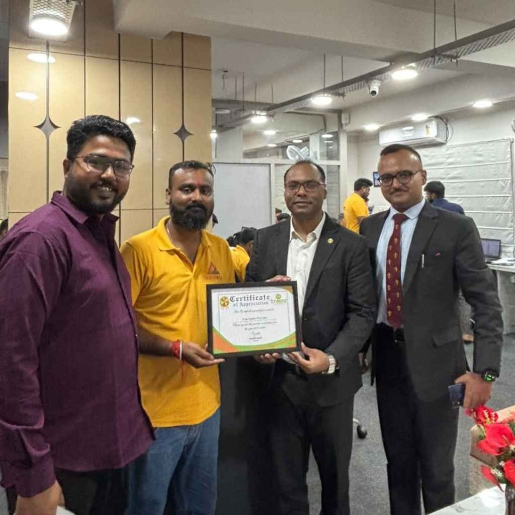 Tripjyada representatives at a certificate presentation